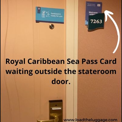 Royal Caribbean sea pass card waiting outside a stateroom door