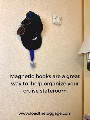 Magnetic hooks are a great way to help organize your cruise stateroom.  Image is a magnetic hook on a cruise room wall with a hat, sunglasses, and a Royal Caribbean medal