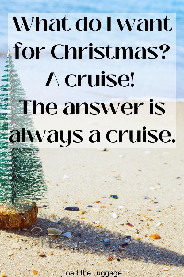 A fake miniature Christmas tree on the beach with the words "What do I want for Christmas? A Cruise! The answer is always a cruise"